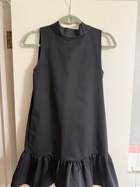 Sleeveless Black Mini Dress with Ruffle Hem